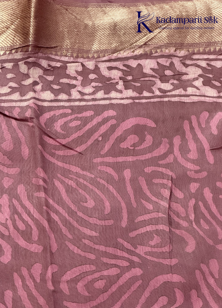 Kadamparii Silk mauve pink soft cotton saree with floral design and zari border, displayed on a white background.