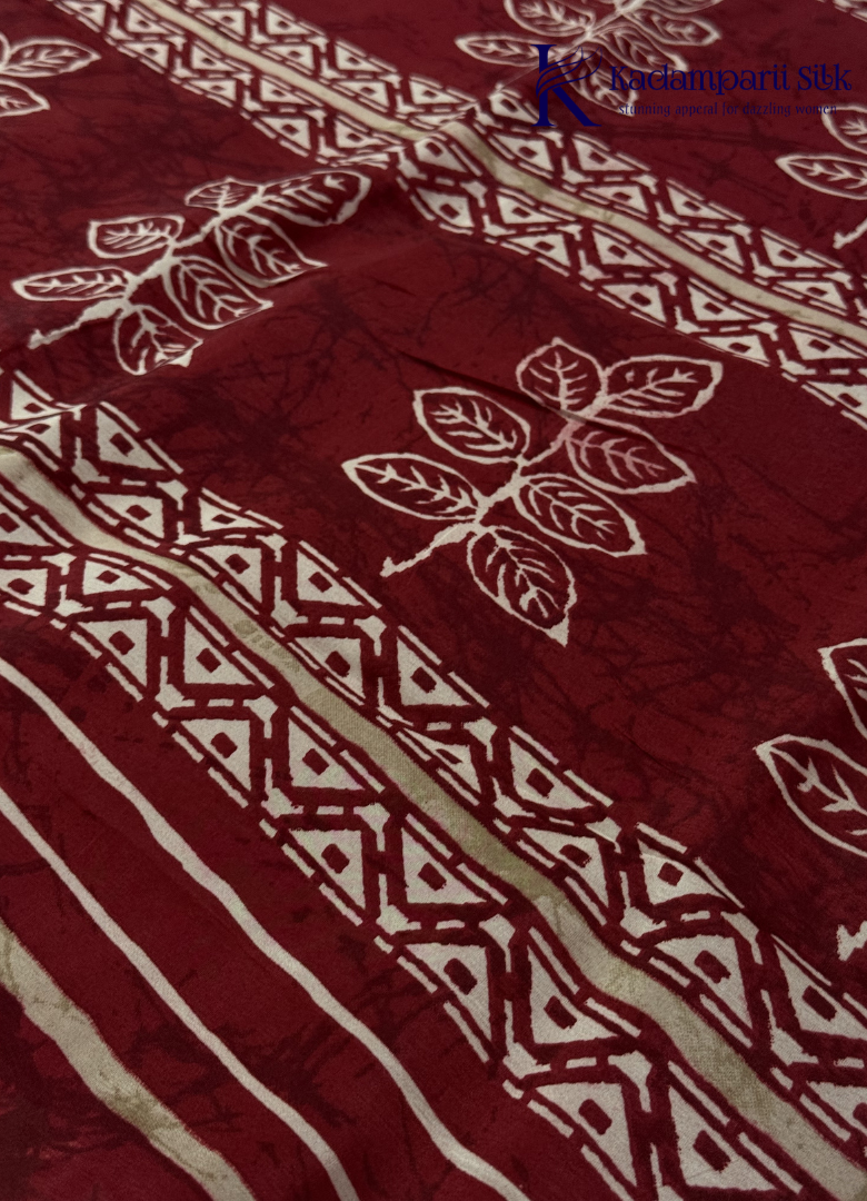 Kadamparii Silk beige semi tussar silk saree with maroon printed pattern and matching striped border, displayed on a white background.