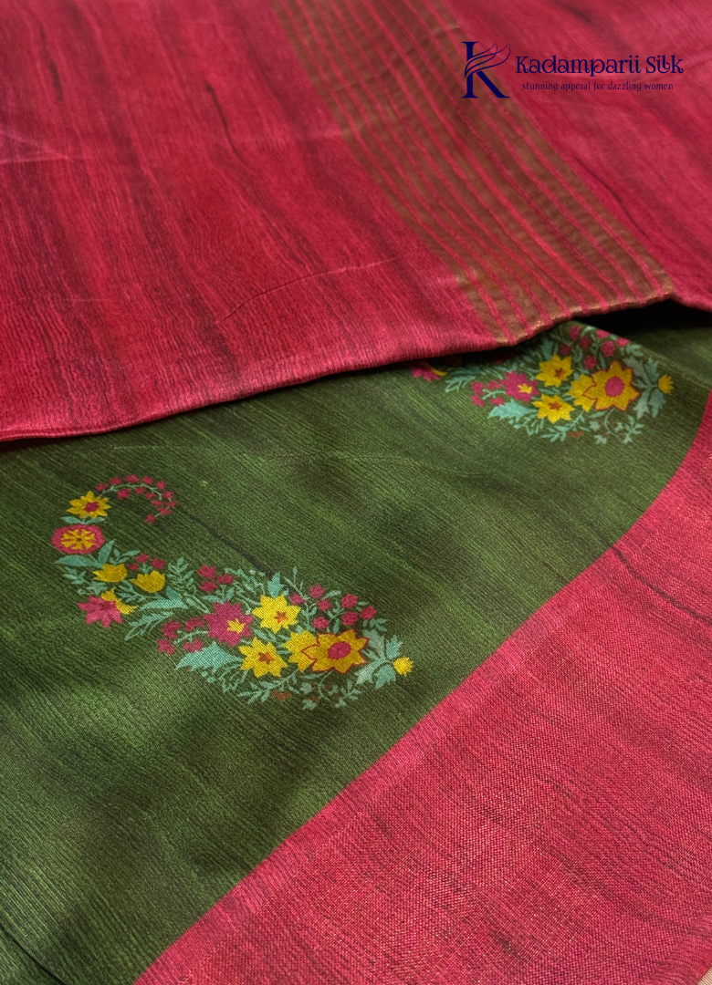 Adorn yourself in this Soft Tussar Silk Saree, featuring a graceful olive green body embellished with delicate floral buttas and finished with a striking rose pink contrast border. Lightweight, elegant, and effortlessly stylish—perfect for every special occasion.