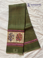 Olive green semi kota saree with checked pattern and artistic printed border by Kadamparii Silk.