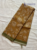 Mustard kota silk saree with floral Kalamkari print and contrast border by Kadamparii Silk.