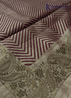 Kadamparii Silk beige tussar silk saree with maroon chevron design and decorative border, displayed on a white background.