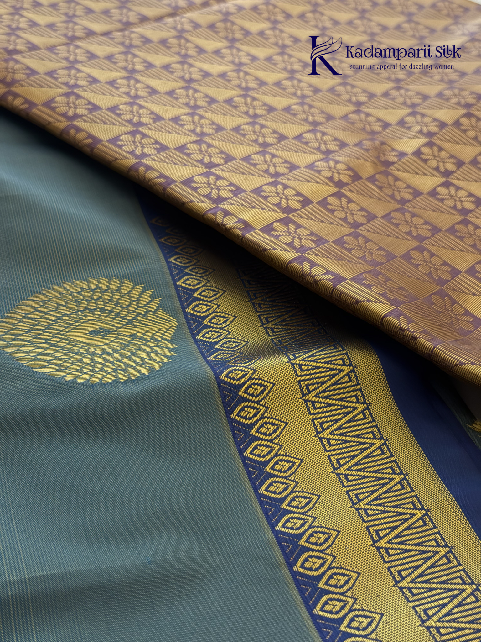 Kadamparii Silk teal blue semi soft silk saree with gold zari motifs, rich purple checkered zari pallu, ornate woven border, royal blue accents, and tassel detailing.
