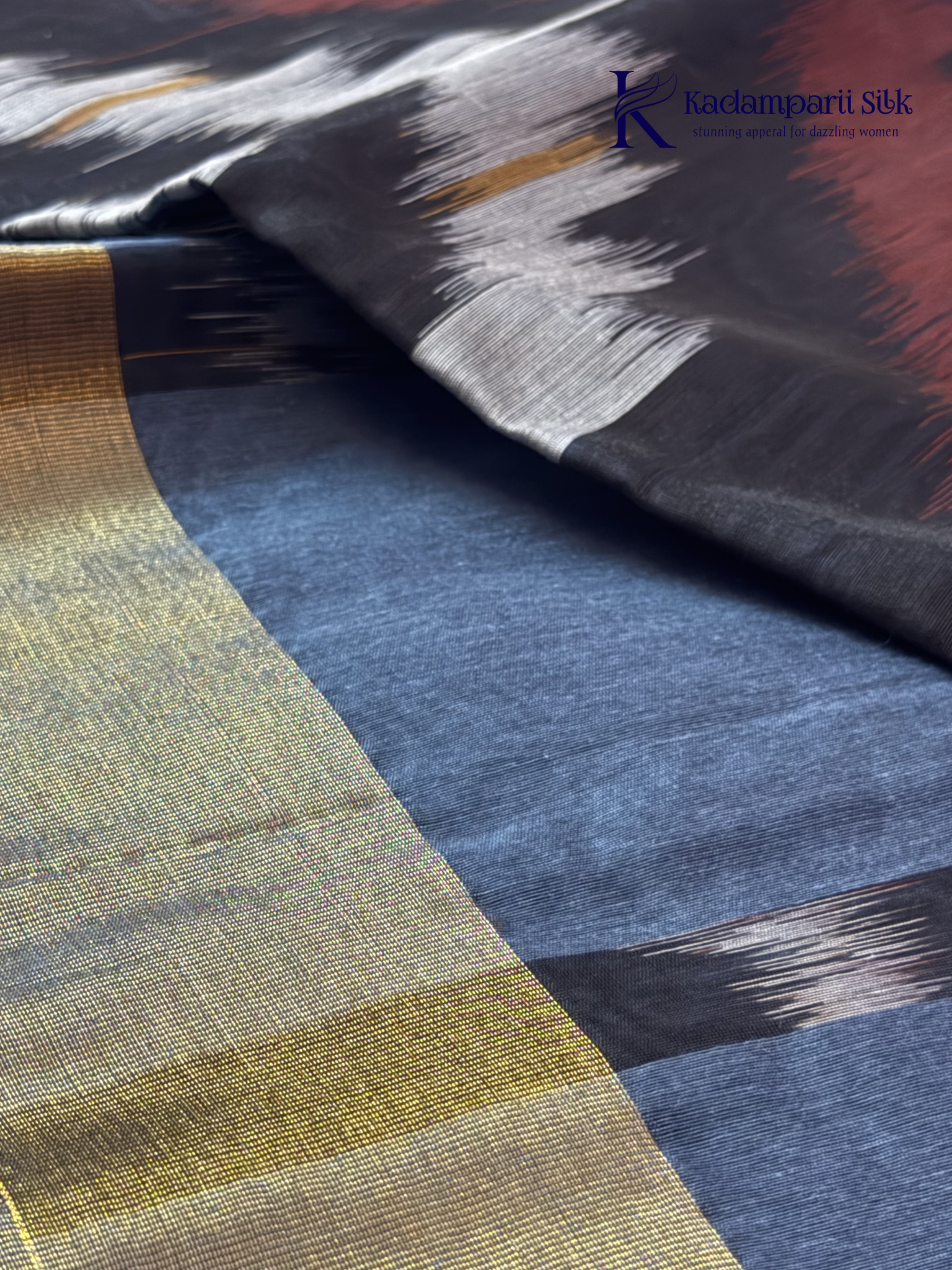 Kadamparii Silk blue Pochampally silk cotton saree with bold ikat geometric patterns, golden zari border, soft lightweight fabric, elegant tassels, and traditional handloom-inspired ethnic design.