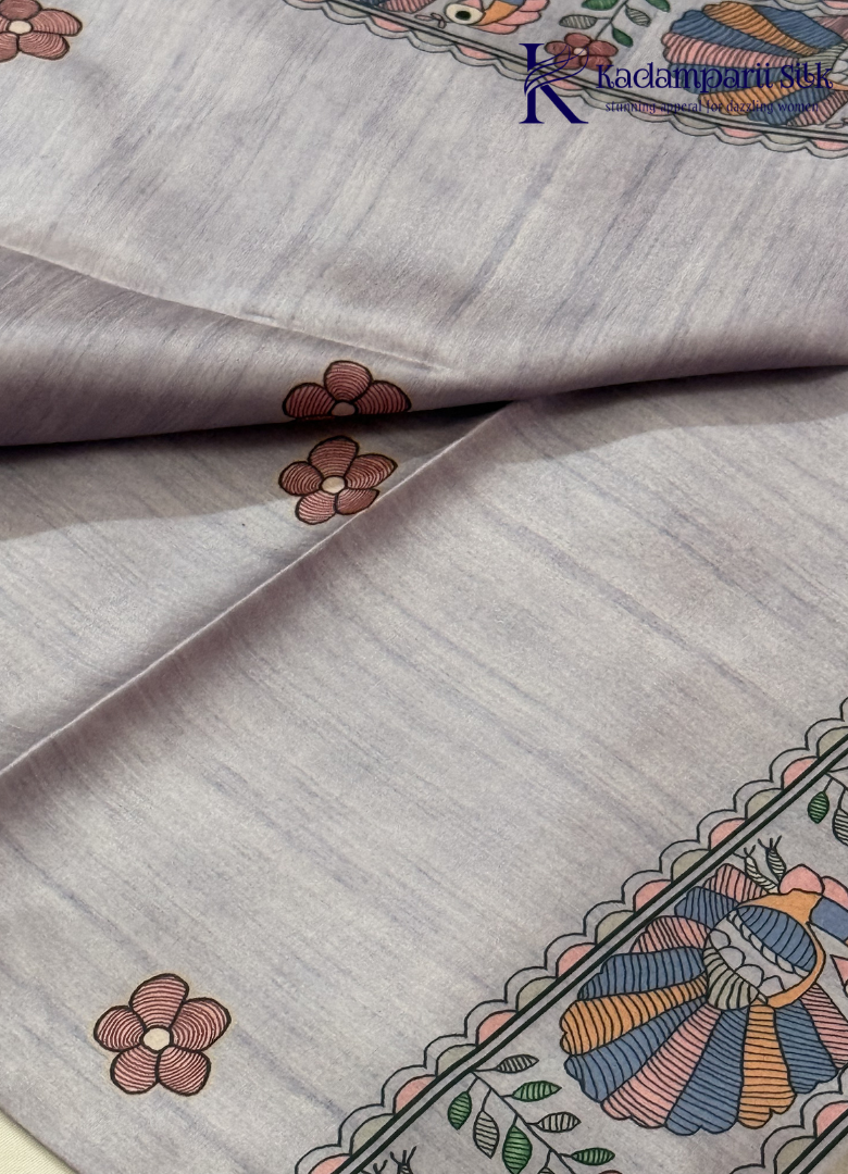 Kadamparii Silk light grey semi tussar silk saree with artistic printed mundhi and floral traditional motifs, displayed on a white background.
