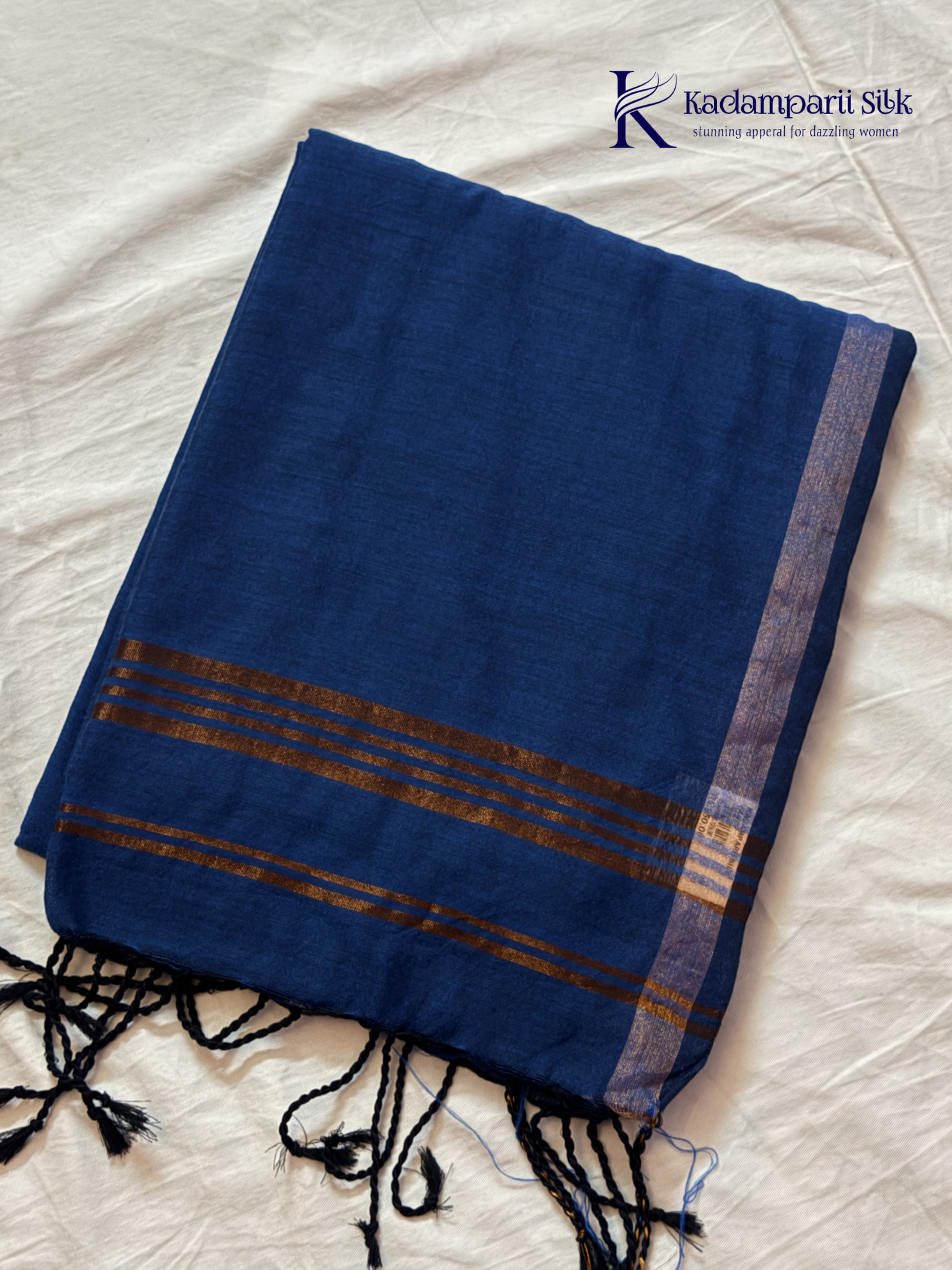 Kadamparii Silk royal blue soft ikkat cotton saree with subtle zari border and matching elephant printed blouse, lightweight breathable fabric, elegant traditional design, and comfortable daily wear style.