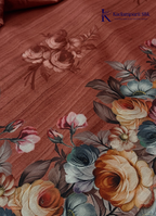Kadamparii Silk rust orange tussar saree with digital body and multicolour floral border, displayed on a white background.
