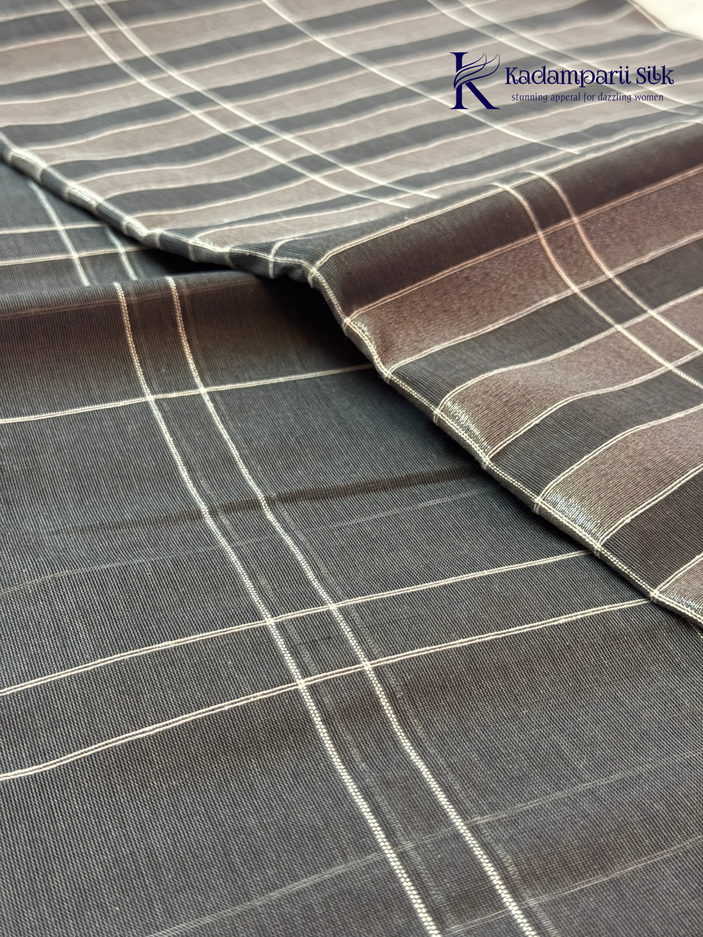 Charcoal grey pure handloom cotton saree with woven stripe and check pattern by Kadamparii Silk.