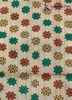 Kadamparii Silk taupe grey semi tussar silk saree with artistic printed mundhi, floral leaf motifs, and multicolour border, displayed on a white background.