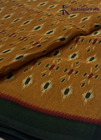 Kadamparii Silk mustard soft semi tussar silk saree with woven pattern and dark contrast border, displayed on a white background.