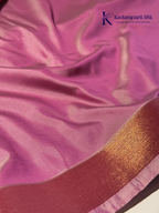 Kadamparii Silk aqua blue semi soft silk saree with magenta zari woven pallu, intricate paisley motifs, floral zari patterns, copper gold border, elegant tassels, and traditional festive design.