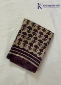 Kadamparii Silk beige semi tussar silk printed saree with wine colour pattern and matching striped border, displayed on a white background.