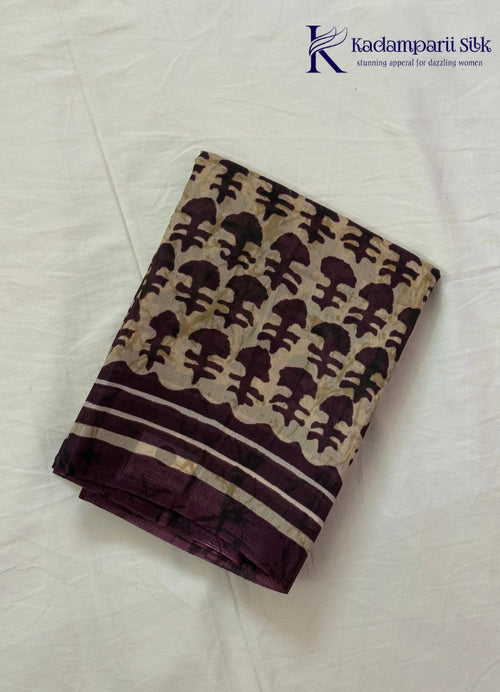 Kadamparii Silk beige semi tussar silk printed saree with wine colour pattern and matching striped border, displayed on a white background.