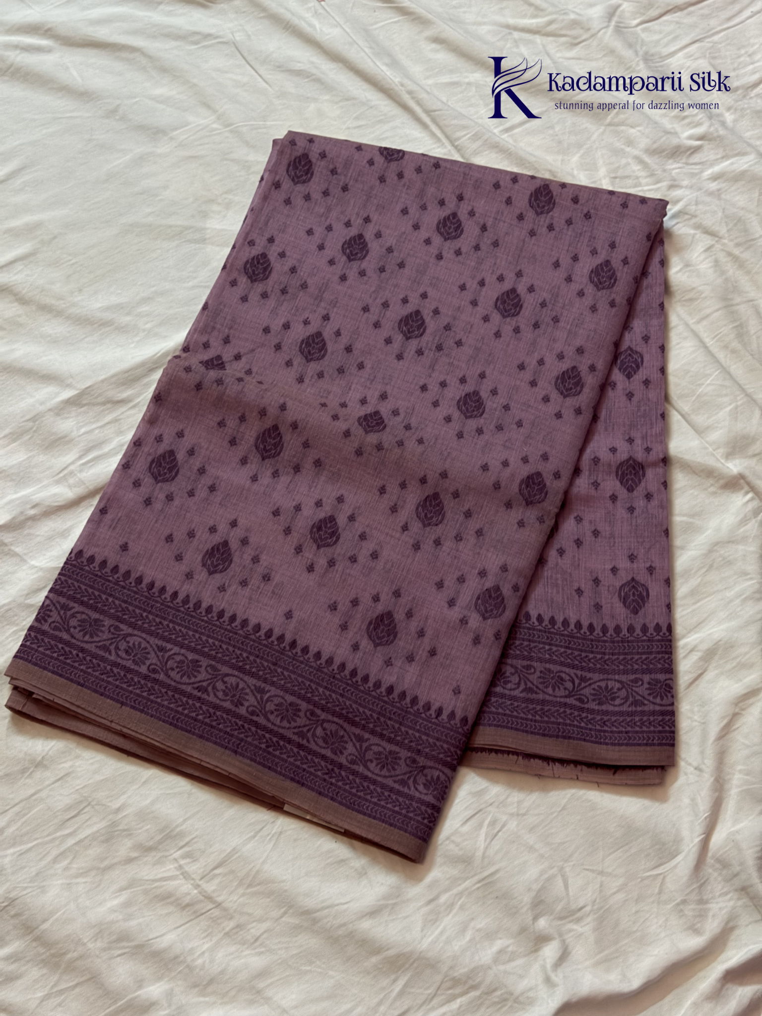 Kadamparii Silk lavender khadi cotton saree with delicate woven traditional motifs, intricate ethnic border design, soft breathable fabric, elegant minimal style, and comfortable everyday ethnic wear.