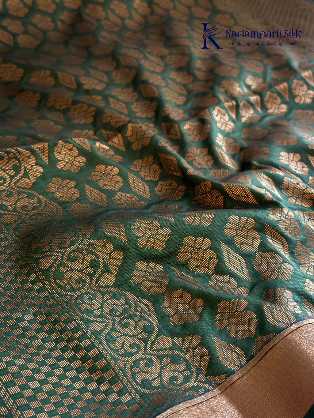 Kadamparii Silk taupe brown semi soft silk saree with olive green zari woven pallu, intricate checkered and floral vine motifs, copper gold zari border, elegant tassels, and traditional festive design.
