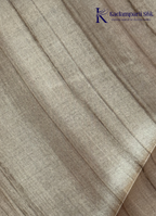 Kadamparii Silk black semi tussar silk saree with traditional printed mundhi and beige border, displayed on a white background.