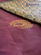 Kadamparii Silk magenta and olive green semi soft silk saree with intricate gold zari weaving, traditional motifs, rich contrast pallu, elegant border, and tassel detailing.