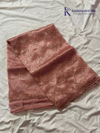 Rose pink shimmer silk saree with elegant sequin embroidery, soft shimmer texture, scalloped border detailing, lightweight flowy fabric, and glamorous partywear styling by Kadamparii Silk.