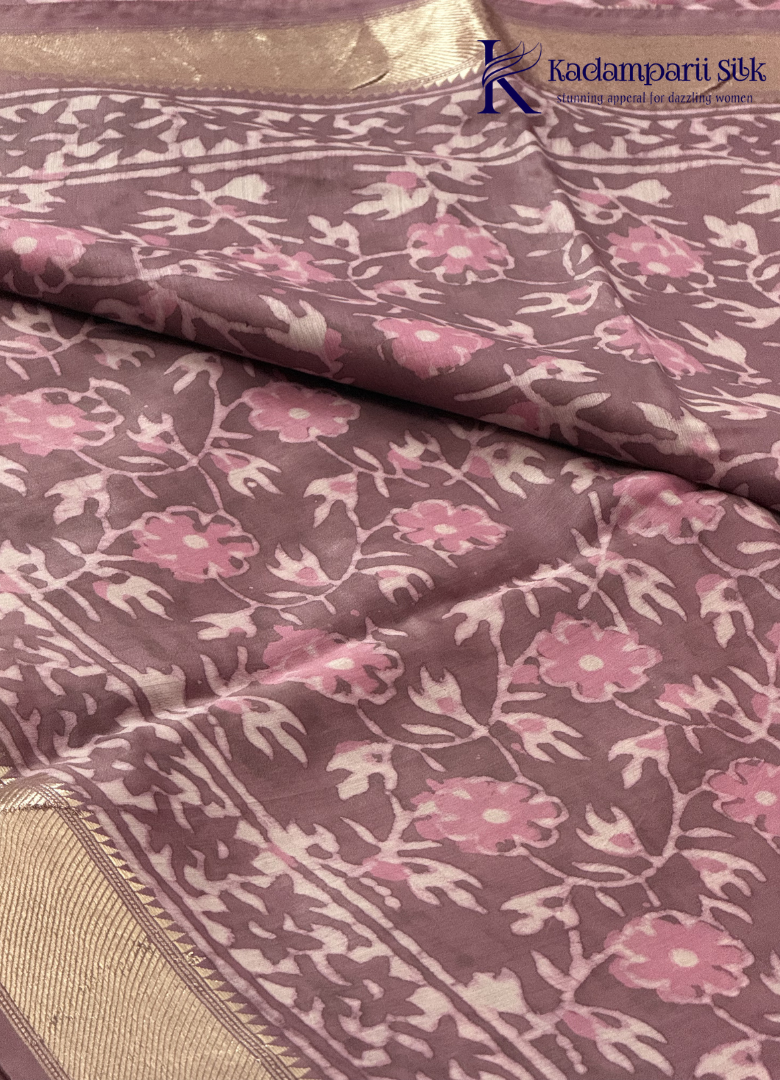 Kadamparii Silk mauve pink soft cotton saree with floral design and zari border, displayed on a white background.