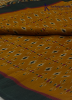 Kadamparii Silk mustard soft semi tussar silk saree with woven pattern and dark contrast border, displayed on a white background.