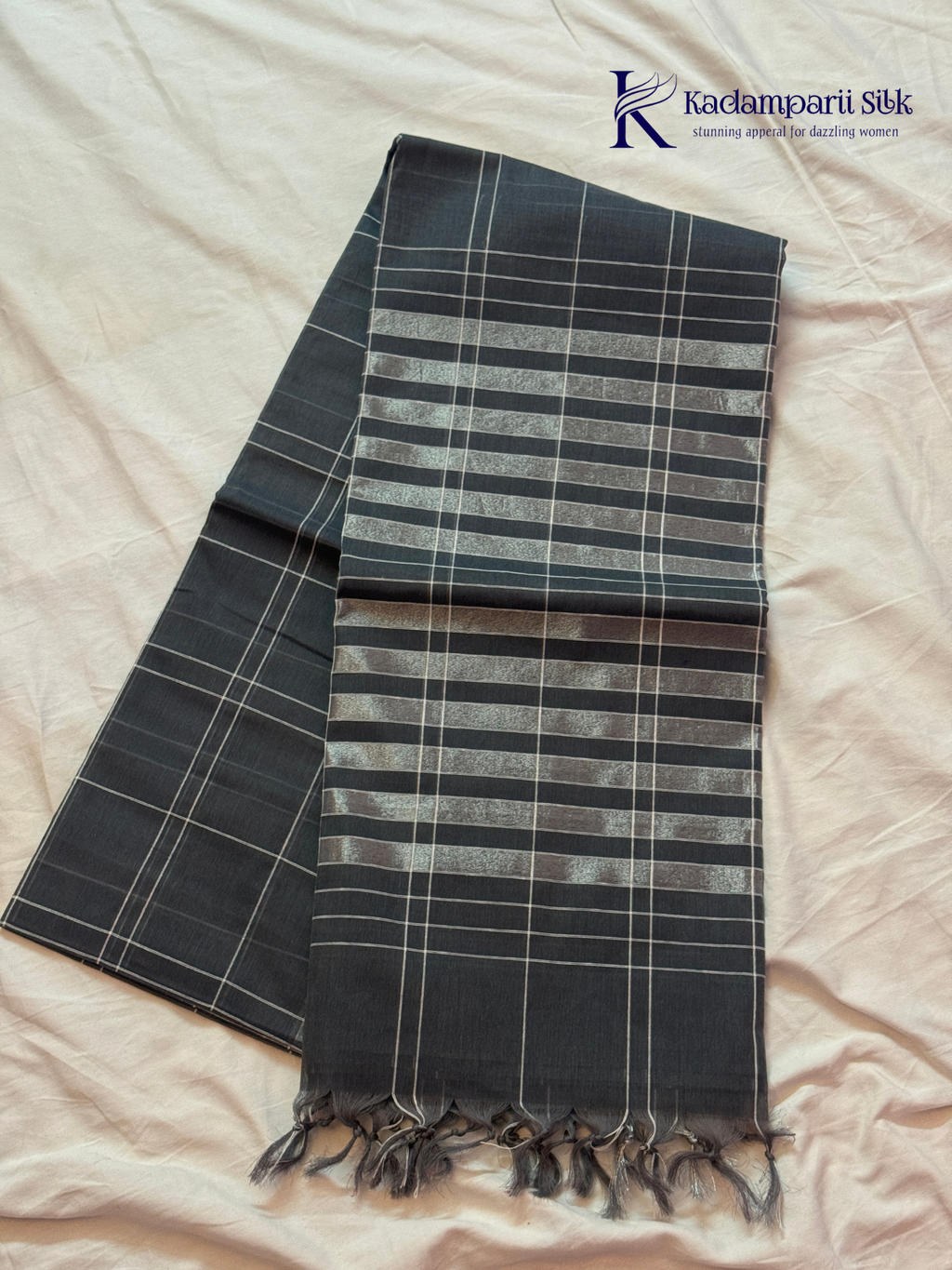 Charcoal grey pure handloom cotton saree with woven stripe and check pattern by Kadamparii Silk.