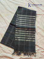 Charcoal grey pure handloom cotton saree with woven stripe and check pattern by Kadamparii Silk.