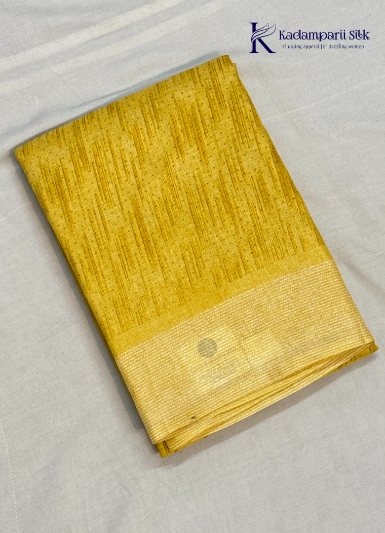 This Sunshine Yellow Semi Soft Silk Saree features a beautifully textured woven body paired with a shimmering zari border, creating a perfect balance of simplicity and sophistication. Lightweight, graceful, and versatile—an ideal choice for festive occasions, office wear, and special gatherings.