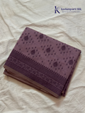 Kadamparii Silk lavender khadi cotton saree with delicate woven traditional motifs, intricate ethnic border design, soft breathable fabric, elegant minimal style, and comfortable everyday ethnic wear.