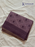 Kadamparii Silk lavender khadi cotton saree with delicate woven traditional motifs, intricate ethnic border design, soft breathable fabric, elegant minimal style, and comfortable everyday ethnic wear.