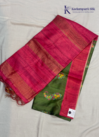 Adorn yourself in this Soft Tussar Silk Saree, featuring a graceful olive green body embellished with delicate floral buttas and finished with a striking rose pink contrast border. Lightweight, elegant, and effortlessly stylish—perfect for every special occasion.