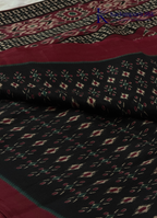 Kadamparii Silk black soft semi tussar silk saree with woven pattern and contrast border, displayed on a white background.