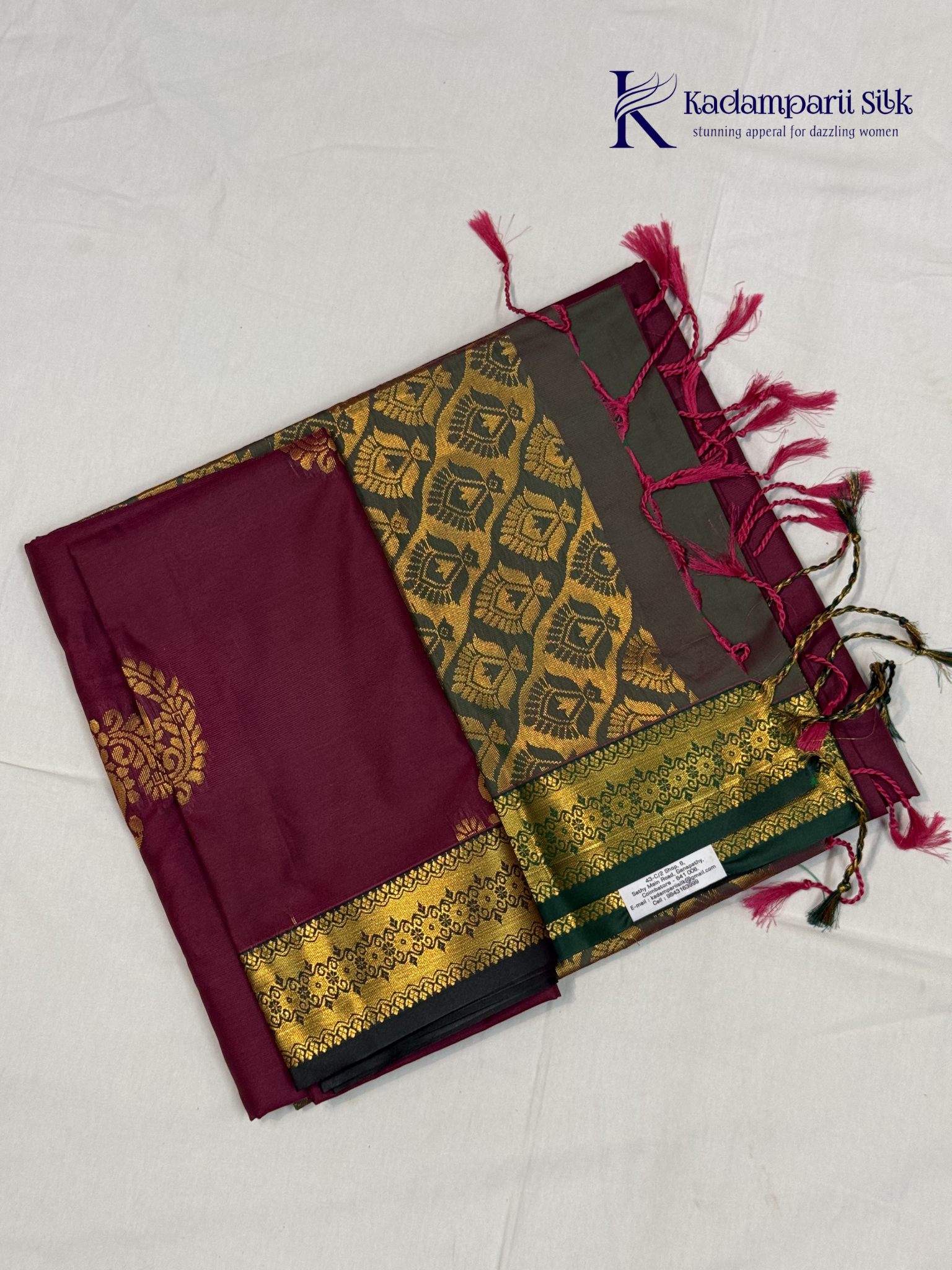 Kadamparii Silk magenta and olive green semi soft silk saree with intricate gold zari weaving, traditional motifs, rich contrast pallu, elegant border, and tassel detailing.
