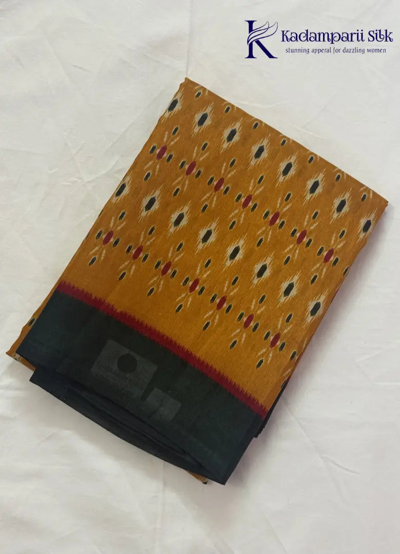 Kadamparii Silk mustard soft semi tussar silk saree with woven pattern and dark contrast border, displayed on a white background.