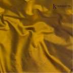 Kadamparii Silk emerald green semi soft silk saree with antique gold zari border, floral woven motifs, rich zari pallu, and elegant tassel detailing.