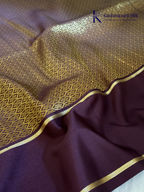 Kadamparii Silk royal wine semi soft silk checked saree with golden zari border, traditional woven pallu, and tassel detailing.