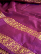 Kadamparii Silk parrot green and magenta semi soft silk saree with gold zari stripes, traditional woven border, rich zari pallu, and tassel detailing.