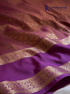 Kadamparii Silk parrot green and magenta semi soft silk saree with gold zari stripes, traditional woven border, rich zari pallu, and tassel detailing.