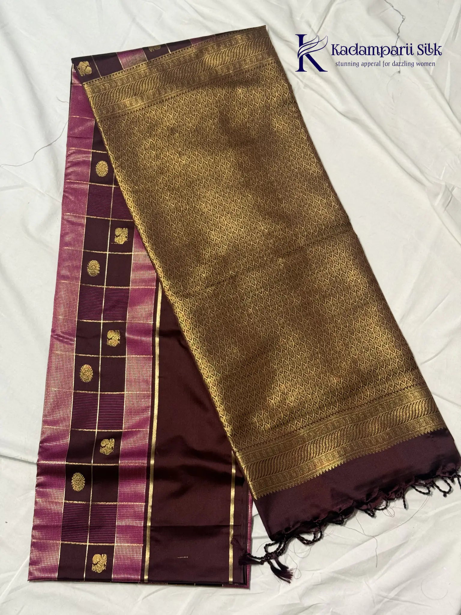 Kadamparii Silk royal wine semi soft silk checked saree with golden zari border, traditional woven pallu, and tassel detailing.