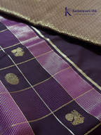 Kadamparii Silk royal wine semi soft silk checked saree with golden zari border, traditional woven pallu, and tassel detailing.