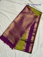 Kadamparii Silk parrot green and magenta semi soft silk saree with gold zari stripes, traditional woven border, rich zari pallu, and tassel detailing.