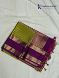 Kadamparii Silk parrot green and magenta semi soft silk saree with gold zari stripes, traditional woven border, rich zari pallu, and tassel detailing.