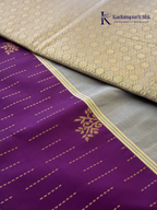 Kadamparii Silk royal purple semi soft silk saree with silver zari woven pallu, floral motifs, elegant border detailing, and tassel finish.