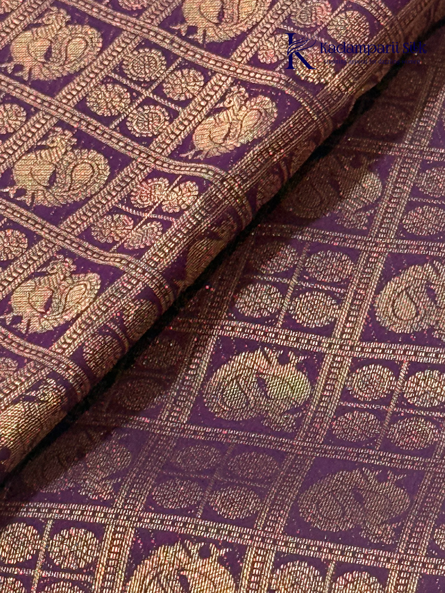 Chocolate brown art silk saree with ice blue zari woven border and traditional peacock motifs displayed on white background Kadamparii Silk