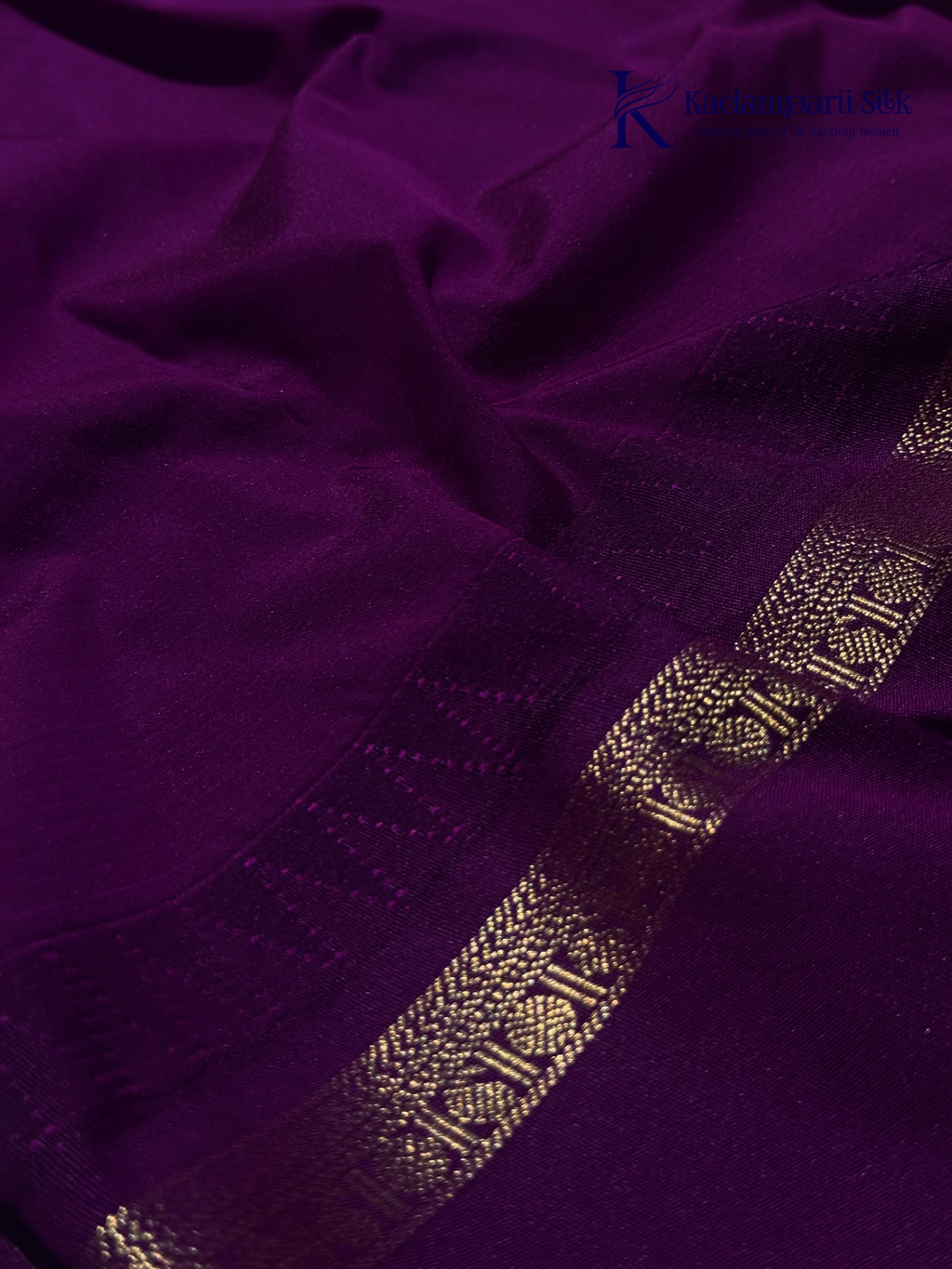 Lime green art silk saree with purple zari border and traditional woven detailing displayed on white background Kadamparii Silk