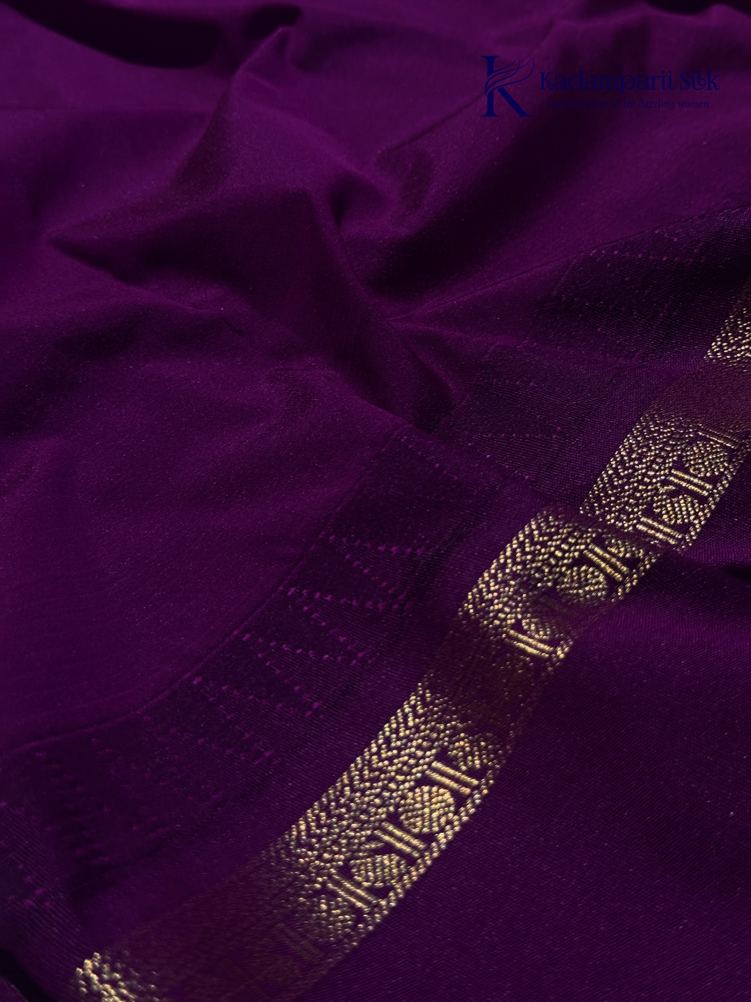Lime green art silk saree with purple zari border and traditional woven detailing displayed on white background Kadamparii Silk