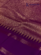 Lime green art silk saree with purple zari border and traditional woven detailing displayed on white background Kadamparii Silk