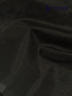 Wine silk cotton saree with black zari woven pallu and gold zari detailing displayed on white background