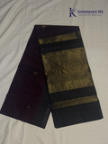 Wine silk cotton saree with black zari woven pallu and gold zari detailing displayed on white background