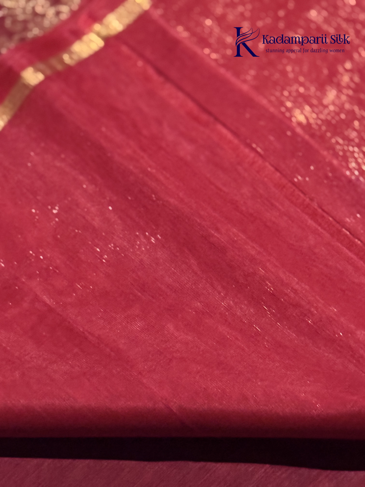Close-up of red fabric with gold accents and Kadampaii Silk