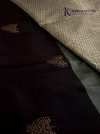 Kadamparii Silk black and sage green semi soft silk saree with gold zari buttas, intricate woven border, rich zari pallu, and tassel detailing.